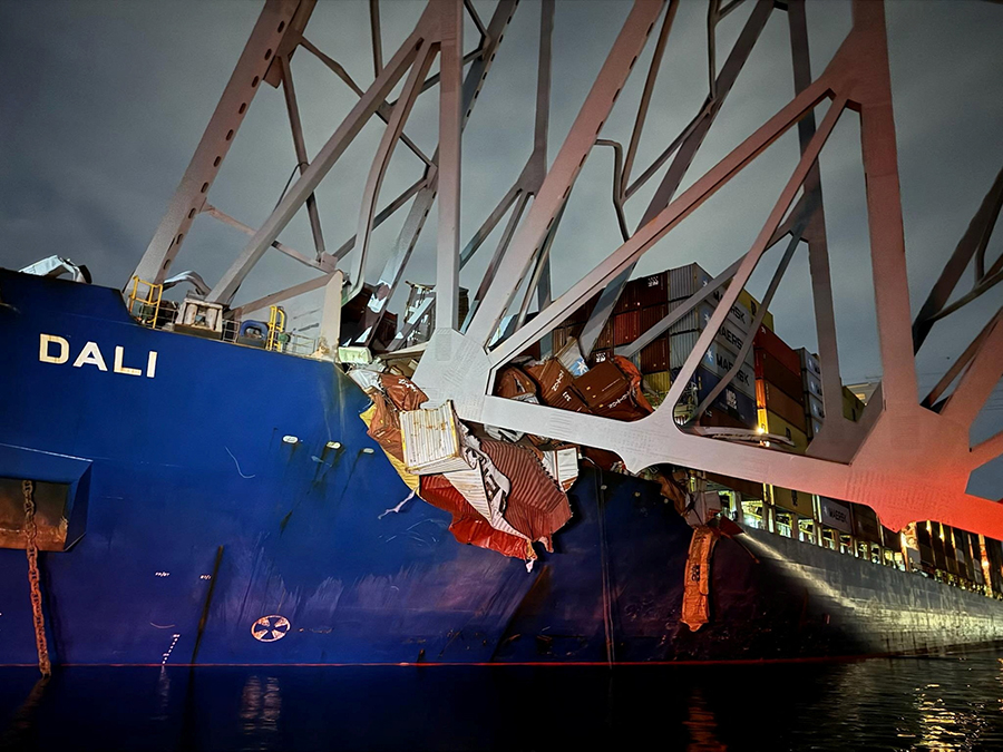 A tragic incident unfolded in Baltimore early Tuesday morning when a massive cargo ship collided with the Francis Scott Key Bridge, resulting in its catastrophic collapse. The aftermath saw vehicles and individuals plummeting into the icy waters below, with six individuals now feared dead, as confirmed by a Coast Guard official during a press briefing later that day.