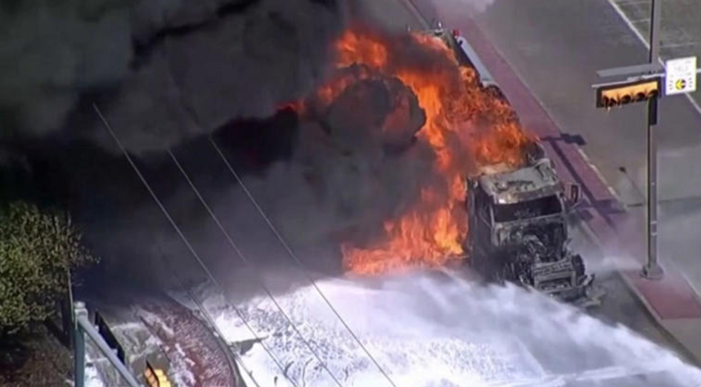 A 5,000-gallon oil tanker caught fire in a Texas community prompts locals to flee